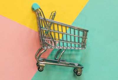 An empty shopping cart waiting for a custom cart coin.