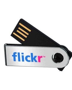 A custom logo mini USB swivel with a chip. The body is black and swivel is silver, it's printed with a blue and pink logo.