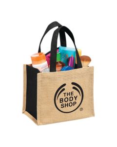 A custom branded mini jute gift tote filled with swag and printed with a black logo.