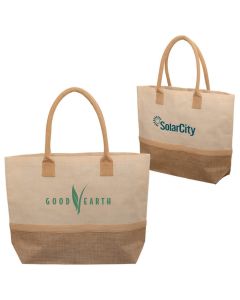 Two laminated totes made from canvas and jute. The front custom branded tote has green print. The other bag has blue print.