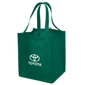 A custom printed jumbo non woven tote. The bag is forest green with a white logo